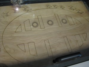 A peek at FabLab's laser cutter in action. 2014.